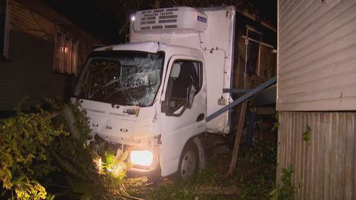 An out-of-control butcher's truck has allegedly led police on a 45-minute pursuit across Queensland's south-east before it smashed into cars and a home.