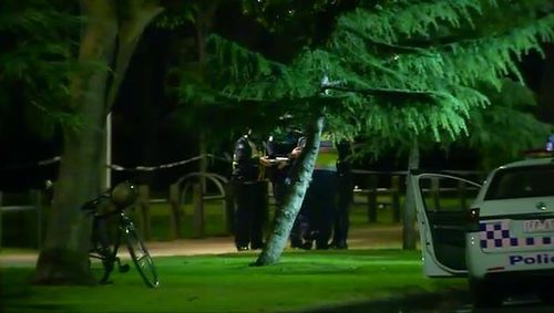 Police have locked down the park in Carlton North after the woman's body was found. Picture: 9NEWS