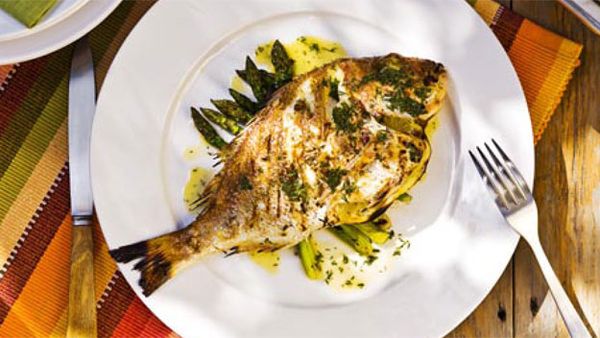 Whole baby snapper and asparagus with beurre blanc