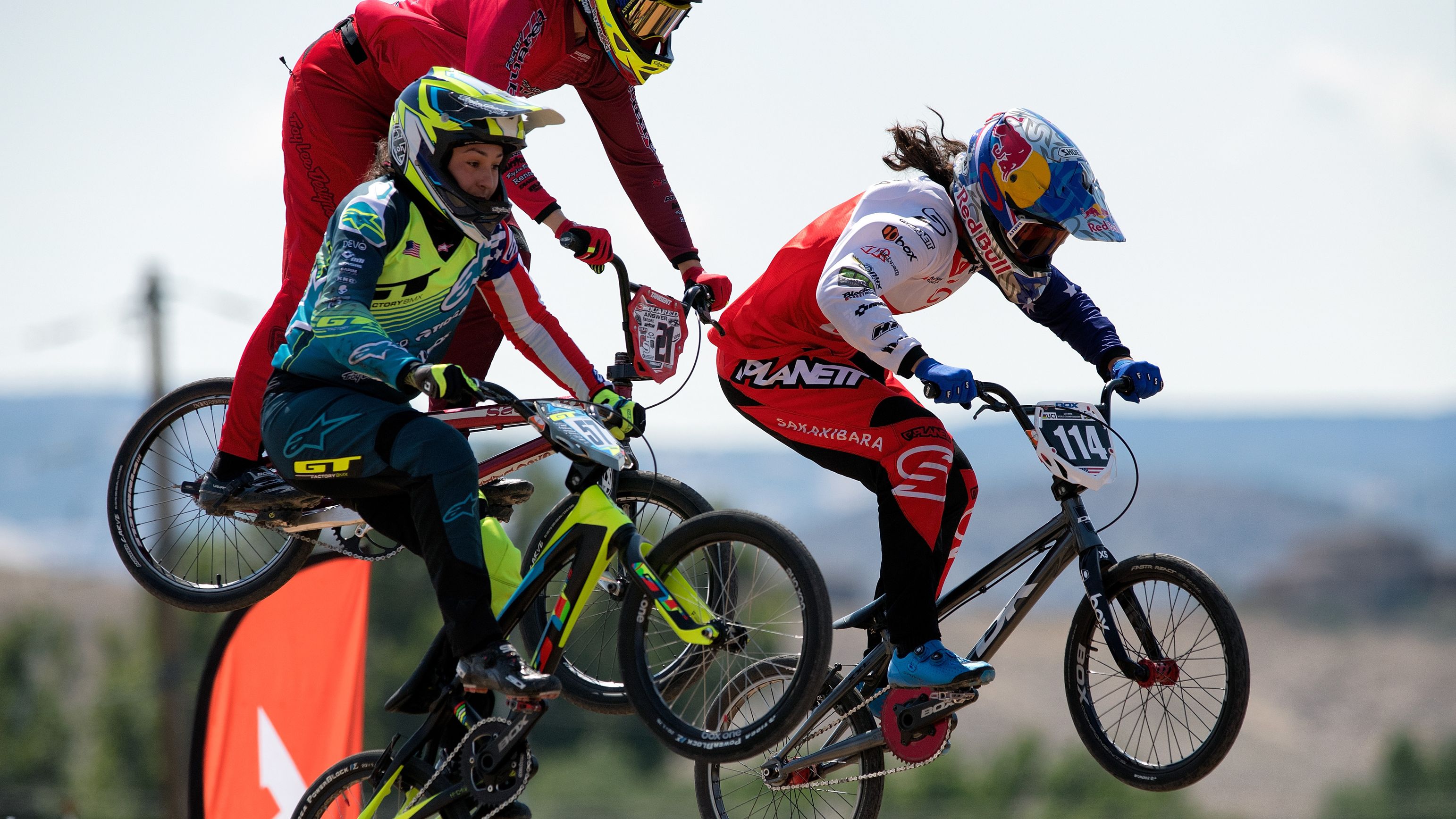 Australia&#x27;s Saya Sakakibara (left) ready to fly off a jump.