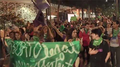 Women were seen at the protest carrying banners that read 'the rich abort, the poor die'. Picture: AP.