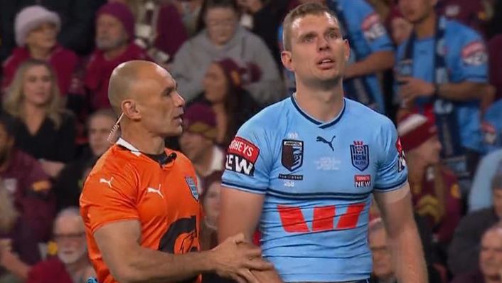 Tom Trbojevic looks dejected as he is helped from the field in the opening minutes of Origin II.