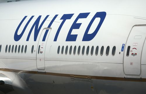 A United Airlines Boeing 777 passenger aircraft at Denver International Airport