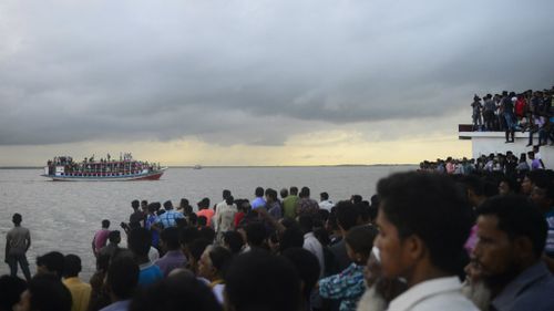 Bodies pulled from the water, dozens missing after 'overloaded' ferry sinks in Bangladesh