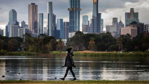 Stormy skies are seen over Melbourne from Albert Park Lake.