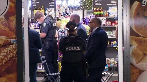 A machete-wielding man has stormed a North Adelaide convenience store and demanded money from a worker. The lone female employee was about to close the store just before 10pm when a hooded man with his face covered ran into the Food Park convenience store on Melbourne Street.