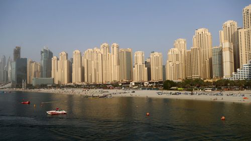 People enjoy the sunshine and relax on the beach at JBR Beach on June 01, 2020 in Dubai, United Arab Emirates.