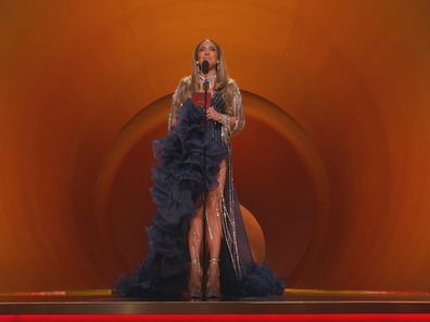 Jennifer Lopez presents at the 2023 Grammy Awards.