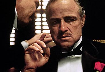 Who directed the Godfather series of gangster films?