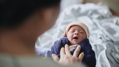 Newborn baby in hospital with mother