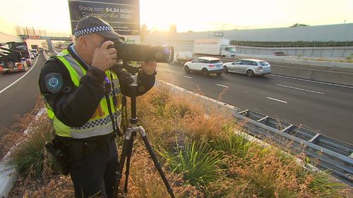 Police used long lens cameras to catch drivers in the act. (9NEWS)
