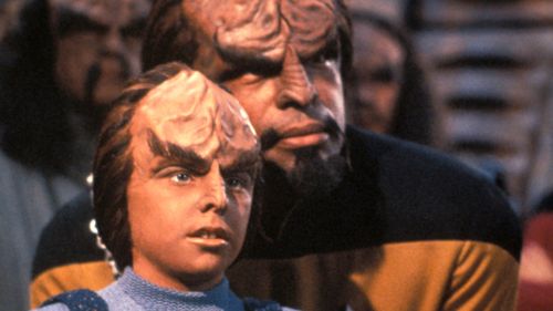 American actors Brian Bonsall (as Alexander Rozhenko) and Michael Dorn (as Lieutenant Worf) in a scene from television series 'Star Trek: The Next Generation'. (Getty)