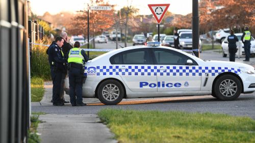 Victoria Police at the scene of a shooting at a home in Roxburgh Park, north of Melbourne. (AAP)