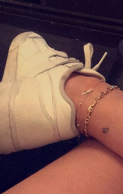 Kylie Jenner, Travis Scott, matching tattoo, ankle, butterfly