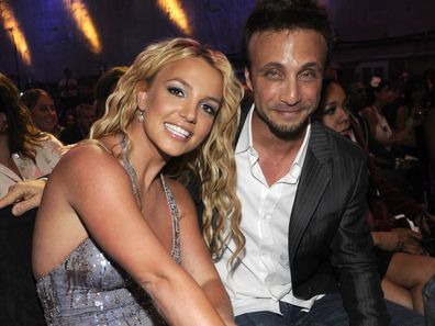 Britney Spears and Larry Rudolph in the audience at the 2008 MTV Video Music Awards at Paramount Pictures Studios on September 7, 2008 in Los Angeles, California.  (Photo by Kevin Mazur/WireImage)