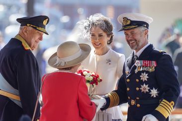King Frederik, right, and Queen Mary of Denmark are welcomed by Norway&#x27;s King Harald, left, and Queen Sonja, upon their arrival in Oslo Tuesday, May 14, 2024. 