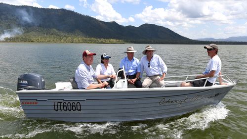 Whitsunday LNP MP Jason Costigan (second from right) believes people throwing food scraps off charter boats could have contributed to the recent spate of shark attacks at Cid Harbour.