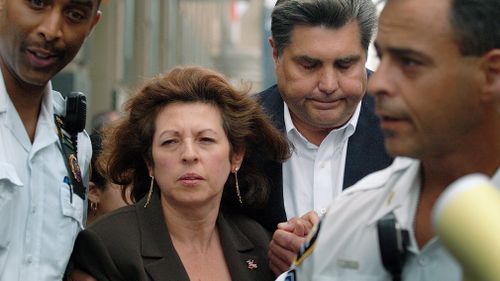 Nancy and Michael Fisher leave Brooklyn Supreme Court. (Getty)