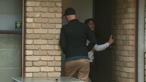 Friends of the victim arrived at the home this morning. (9NEWS)