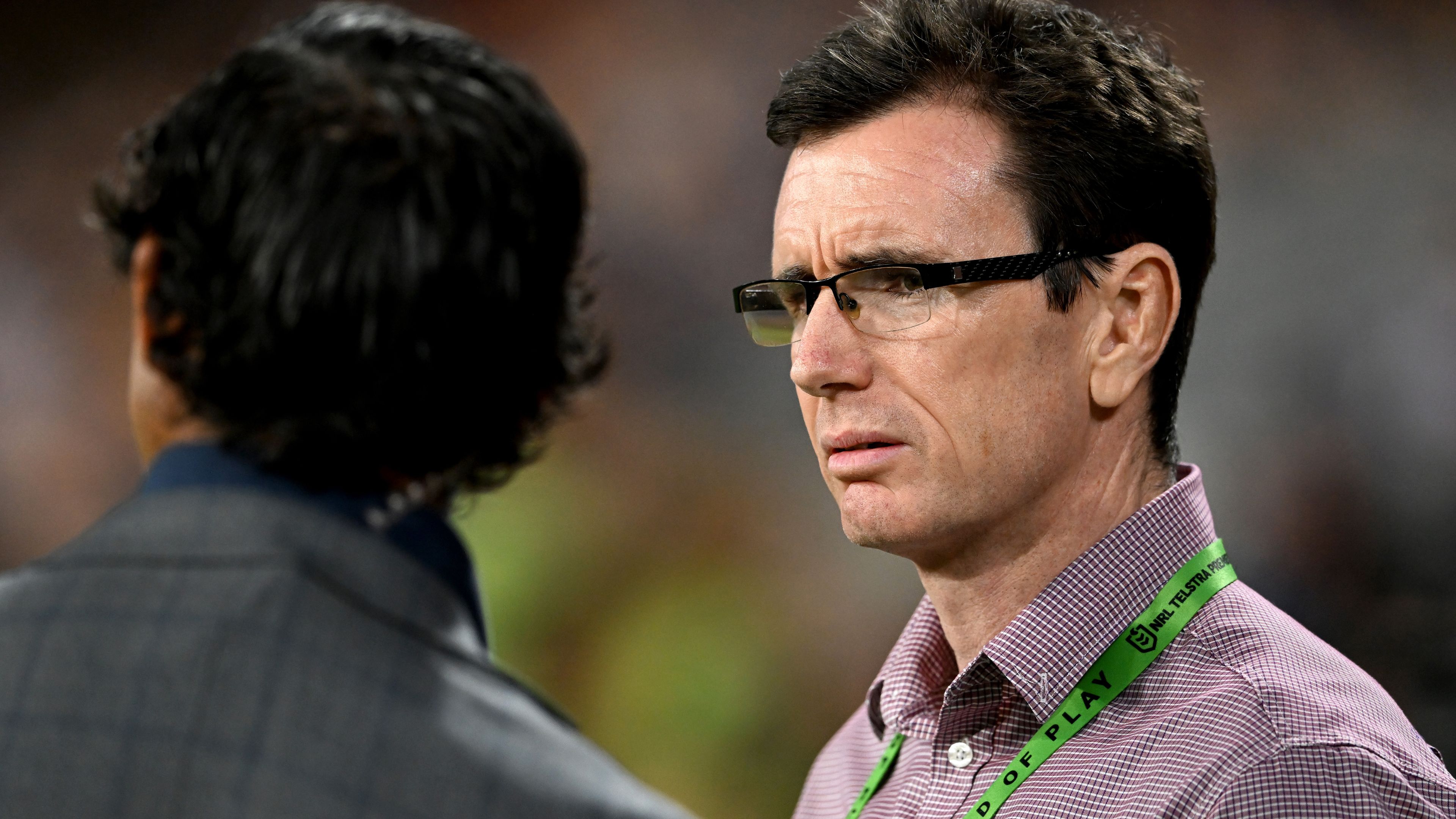 Broncos Manager of Football Ben Ikin is seen chatting with Johnathan Thurston during the round seven NRL match between the Brisbane Broncos and the Canterbury Bulldogs at Suncorp Stadium, on April 22, 2022, in Brisbane, Australia. (Photo by Bradley Kanaris/Getty Images)