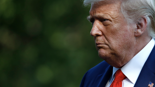 President Donald Trump walks on the South Lawn of the White House in Washington, Wednesday, July 15, 2020, after stepping off Marine One. Trump is returning from Atlanta. (AP Photo/Patrick Semansky)