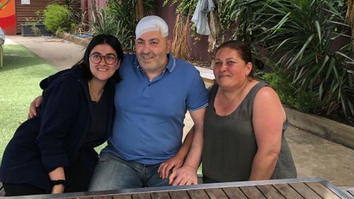 Fady Al-Sarouny, 54, with his daughter and wife.