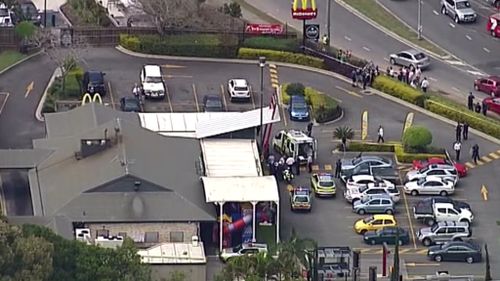 Police at the scene in Helensvale. (9NEWS)