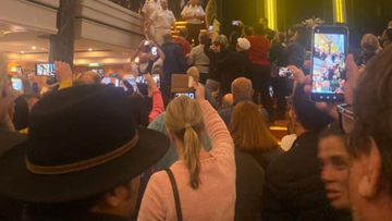 Passengers gathered in the atrium of Norwegian Spirit cruise ship on Monday to protests skipped ports of call.