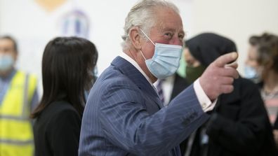 Prince Charles, Prince of Wales wears a face mask as he visits a vaccination pop-up centre at Finsbury Park Mosque on March 16, 2021 in London, England. 