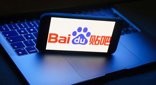 Baidu logo displayed on a phone screen and a laptop.