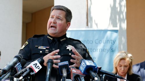 Sacramento County Sheriff Scott Jones (L) responds to reporter's questions after Mr DeAngelo's arrest was announced. (EPA)