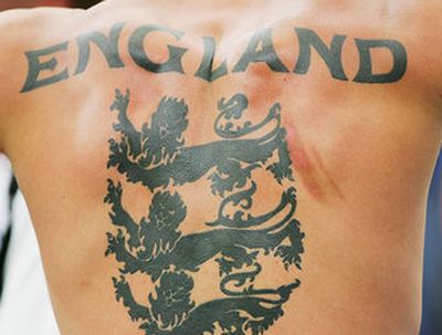 This England fan will never be confused as to which team he supports.