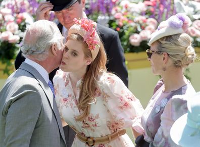 Prince Charles, Prince of Wales, greets Princess Beatrice of York as they attend Royal Ascot 2022 at Ascot Racecourse on June 14, 2022 in Ascot, England 