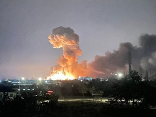 An explosion is seen in the Ukrainian capital of Kyiv early Thursday, February 24.