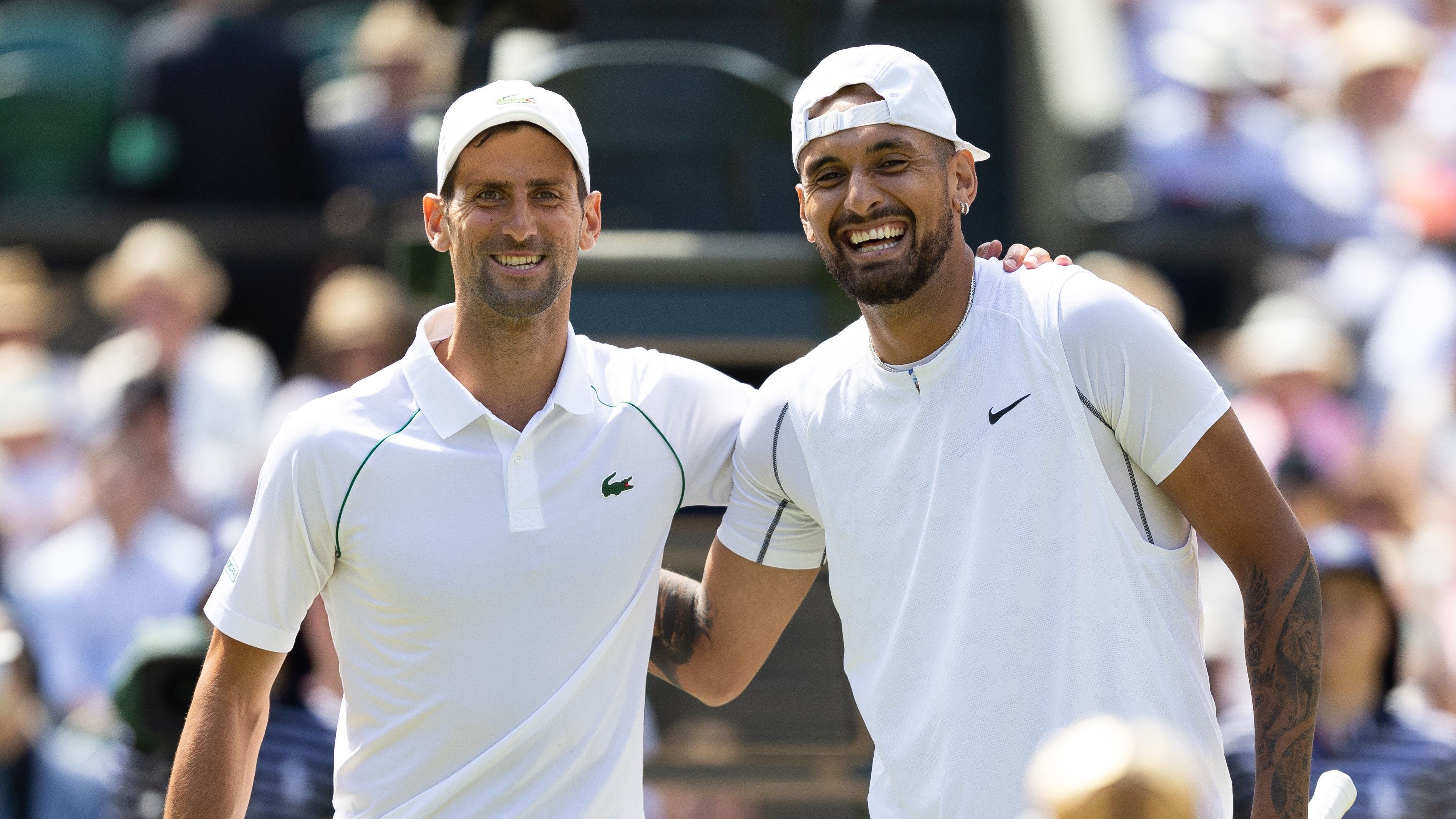 Novak Djokovic and Nick Kyrgios pose before the final at Wimbledon. 