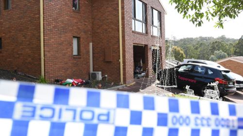 Tupperware cars and Christmas lights at the scene of the fatal balcony collapse. (AAP)