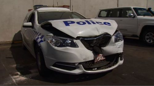 Two officers injured after car rammed police van in Melbourne's north