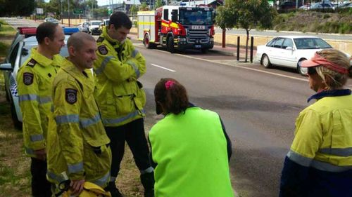 Fire crews worked to save the kitten from the drain. (Picture: Supplied)