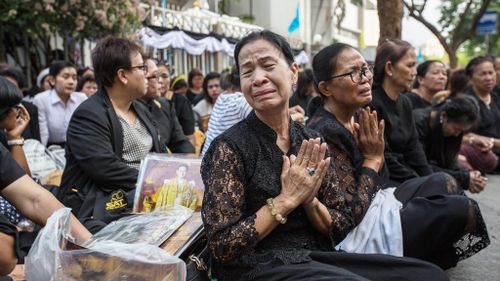 Grieving Thailand salutes late king