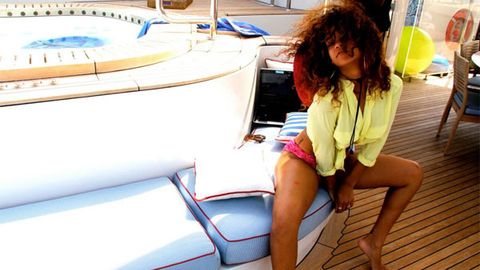 Rihanna shares her sexy holiday snaps