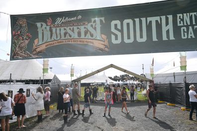 Festival visitors enter one of the main entrances during day one of the Byron Bay Bluesfest on April 14, 2022 in Byron Bay, Australia. The music festival returns after a two-year break due to the coronavirus pandemic. (Photo by James D. Morgan/Getty Images)