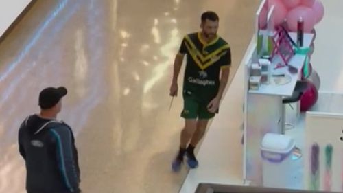 Video appeared to show a knife-wiedling man wearing a rugby league jersey.