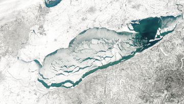A satellite image from the US National Oceanic and Atmospheric Administration shows the crack in the ice on Lake Erie.