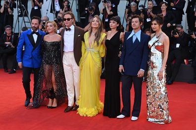Nick Kroll, Florence Pugh, Chris Pine, Olivia Wilde, Sydney Chandler, Harry Styles and Gemma Chan attend the "Don't Worry Darling" red carpet at the 79th Venice International Film Festival on September 05, 2022 in Venice, Italy.