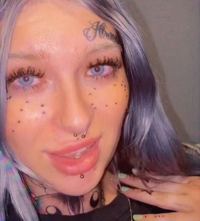 Woman tattoo freckles