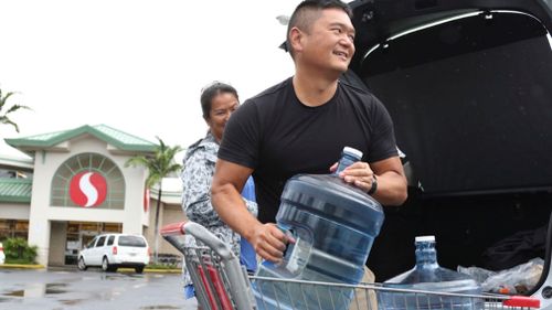 Residents are stocking up on essentials are they prepare for Lane to reach Hawaii.