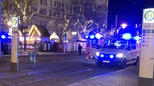 Emergency services attend an incident at the Christmas market in Magdeburg, Germany, Friday Dec. 20, 2024. (Dörthe Hein/dpa via AP)