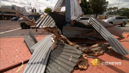 The isolated storm destroyed sheds and tore roofs off. (9NEWS)