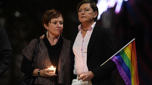 Christine Forster (right), the sister of former prime minister Tony Abbott, with her partner Virginia Edwards. (AAP)