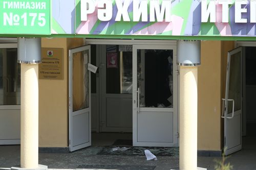 KAZAN, RUSSIA  MAY 11, 2021: Shattered glass by the entrance to school No 175 where two attackers opened fire; at least one teacher and eight students are reported dead. Yegor Aleyev/TASS (Photo by Yegor AleyevTASS via Getty Images)